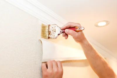 Pose de papier peint à Herran — revêtements muraux et toiles de verre